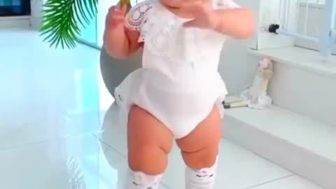 Cute baby in happiest mood.