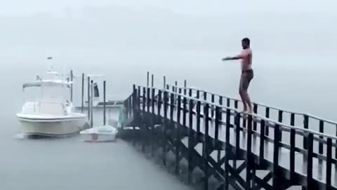 Get guys ready to jump and dive off of pier slips and flips into water fail