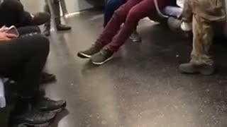 Guys subway dance battle