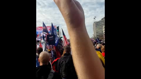 Crowd Sings National Anthem At Million MAGA March