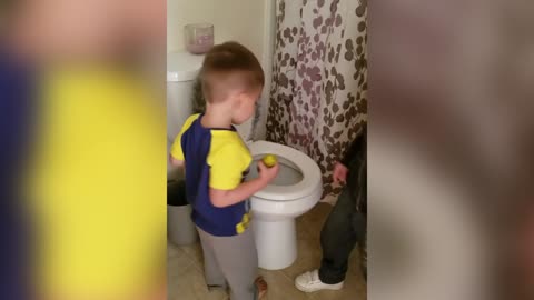 Little Boy Tries To Help Dad After Being Flushed Down The Toilet