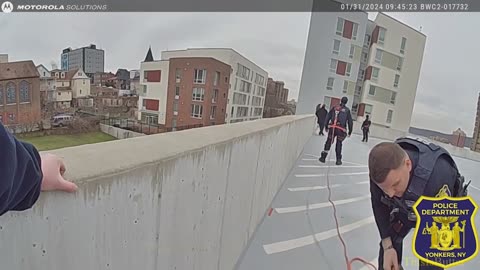 Yonkers Police save woman in distress from the top level of a parking garages ledge