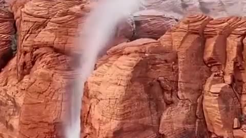 Waterfall flows backwards, due to high winds in Utah