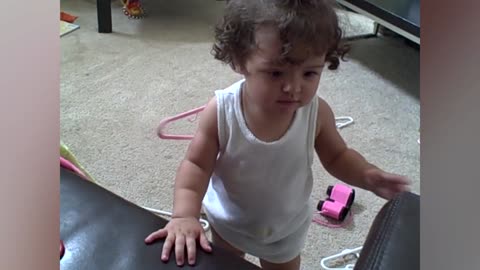 Cute Girl Gets Coat Hanger Stuck In Her Hair