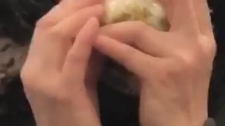 Woman eating an entire onion