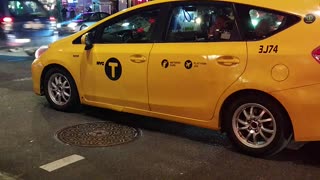 Man in Midtown Climbs on Cars