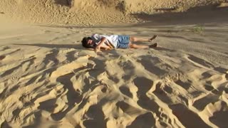 Rolling in the Witsand Dunes in South Africa
