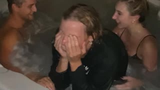 Friends Take Phone and Push Girl into Hot Tub