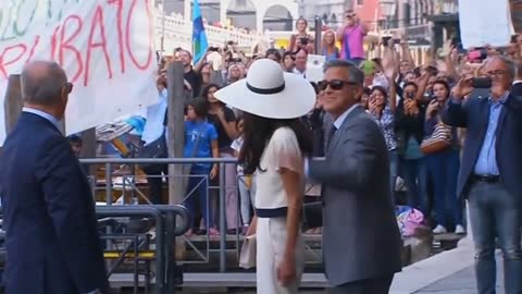 Clooney, Alamuddin formalize marriage; Lopez involved in accident