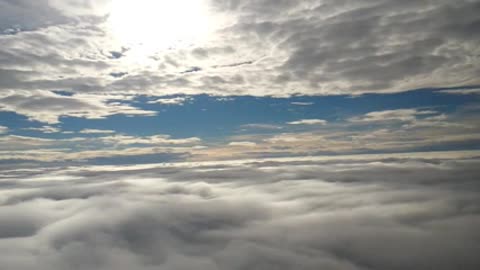 Flying Between The Clouds