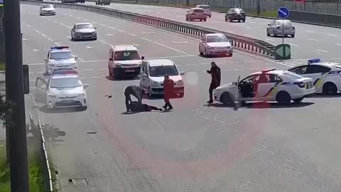 Dnipro, Ukraine, a motorcyclist tried to slip past a police checkpoint.