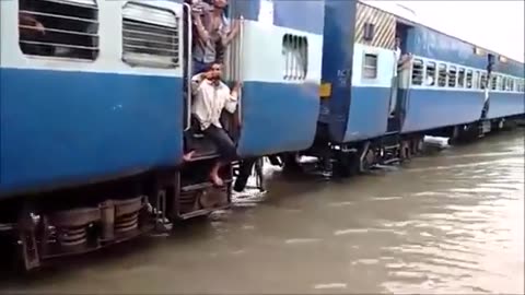 Train is paaing in the water in india