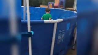 Collab copyright protection - little boy slips plastic pool