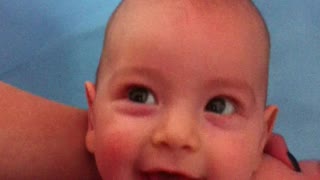 Baby is laughing while bathing. so cute!