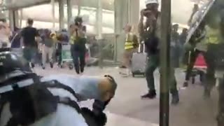Police and protesters clash at Hong Kong Airport