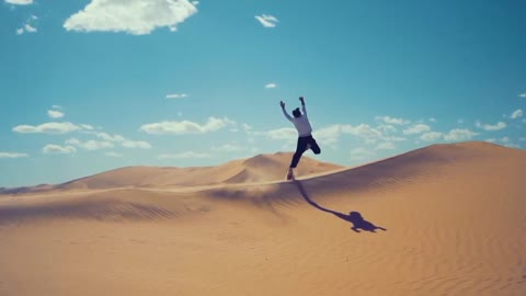 A Man running on sand...