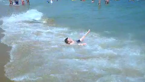 Wave Flips Little Boy Head Over Heels