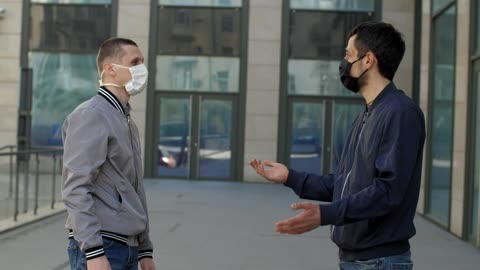 Friends saluting each other for health