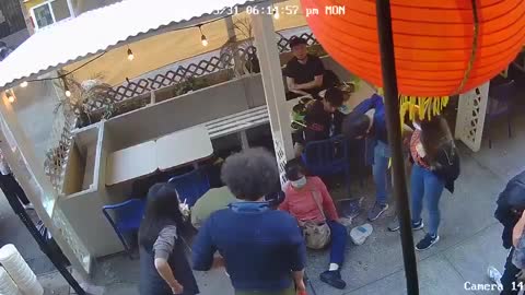 Guy Randomly Punches Asian Woman Outside a NYC Restaurant