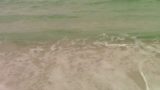 Waves Breaking on the Beach