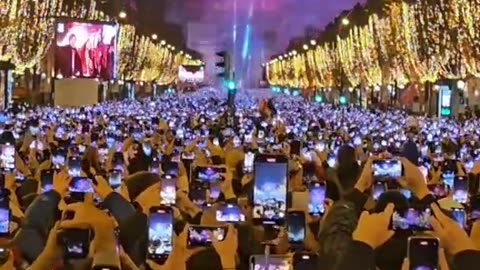 Internet users upset with attendees in Paris shown recording New Years celebrations