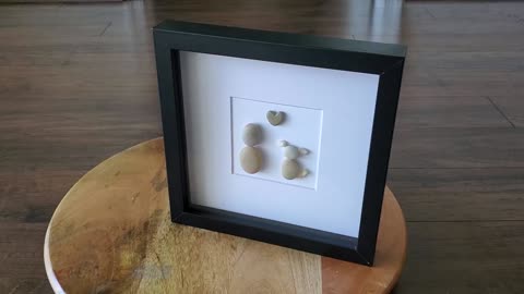 Pebble Artwork of Puppy and Best Friend