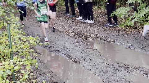 Athlete Dives Into Mud Puddle During Race