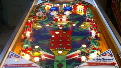Playing a 1976 Space Mission pinball machine.