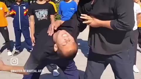 A kung fu teacher demonstrates a very effective technique