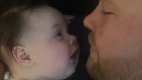 Baby helps dad sing himself to sleep