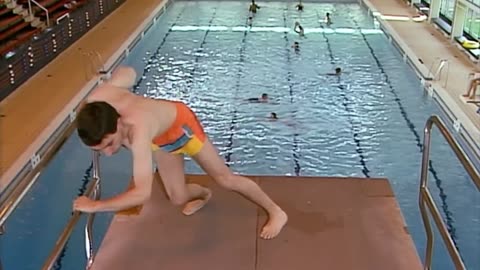 Mr Bean goes swimming and tries to attempt the diving board!