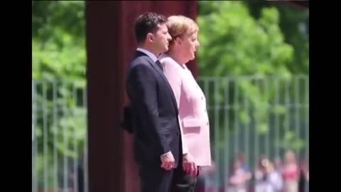 Uncontrollable Shaking by Berlin Chancellor At Ukraine Ceramony