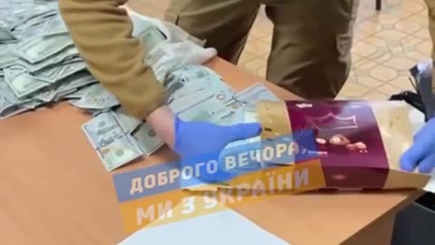 Ukraine Laundry Mat: Ben Franklin Getting Sorted Out by A Zelensky Thug