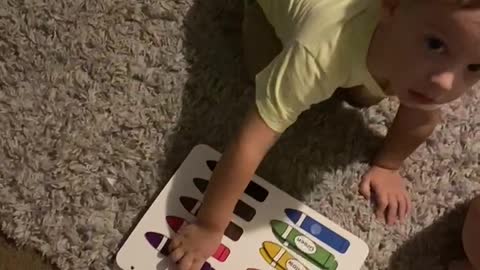 One year old learns colors