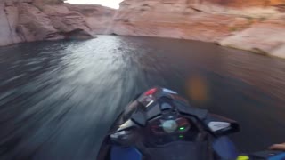 Jet Ski Racer Rides through Canyons