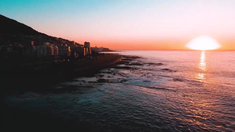 HD DRONE FLIGHT CAPE TOWN SOUTH AFRICA AT SEA POINT PROMENADE