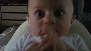 Daddy's roar hilariously startles baby