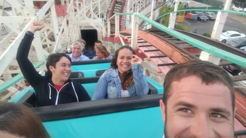 Family goes for fun roller coaster ride
