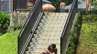 Swimmer Slips On Stairs