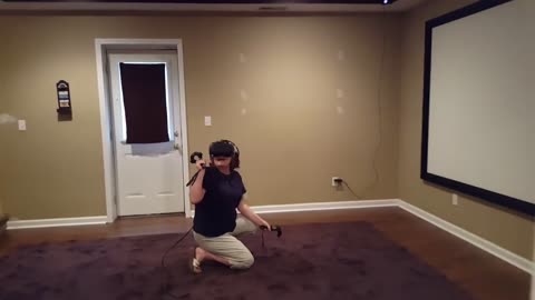 Mom can't handle VR experience, falls to the ground
