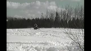 Guy Jumps Snowmobile Off House And Crashes Hard