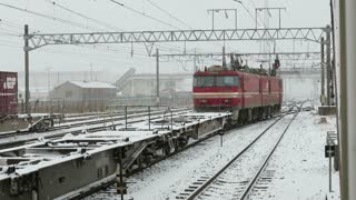 Freight train leaving the yard