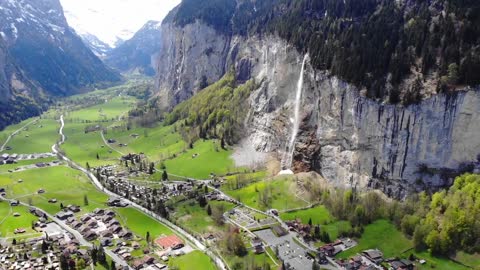 Look at the beauty Village built in a valley between mountain