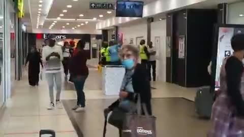 Woman pulls a gun on EFF members during a protest in Port Elizabeth