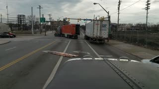 Truck's Rear Door Swinging in the Wind