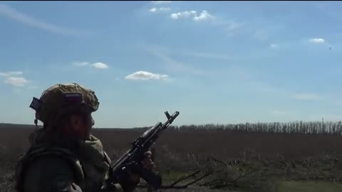 Russian soldiers successfully repel a Ukrainian FPV drone attack.