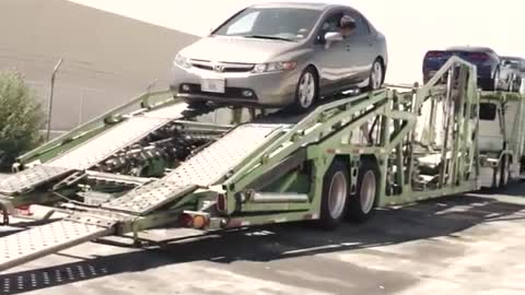 Loading a Car Carrier: A Brief Inside Look