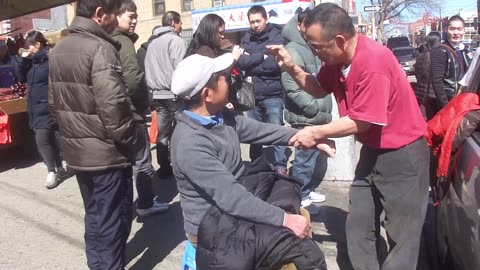 Luodong Briefly Massages Elderly Chinese Man On Sidewalk