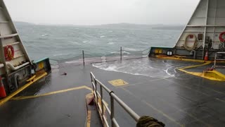 Winter waves crashing over prow of San Juan Islands ferry