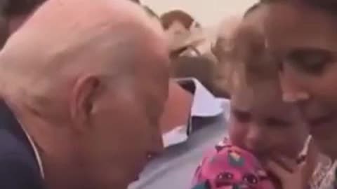 Parents serving their little kid to Biden